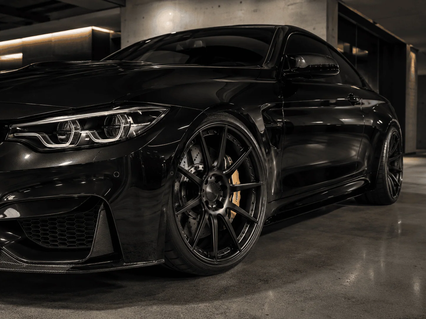 Deep-concave forged wheels with visible performance brake calipers