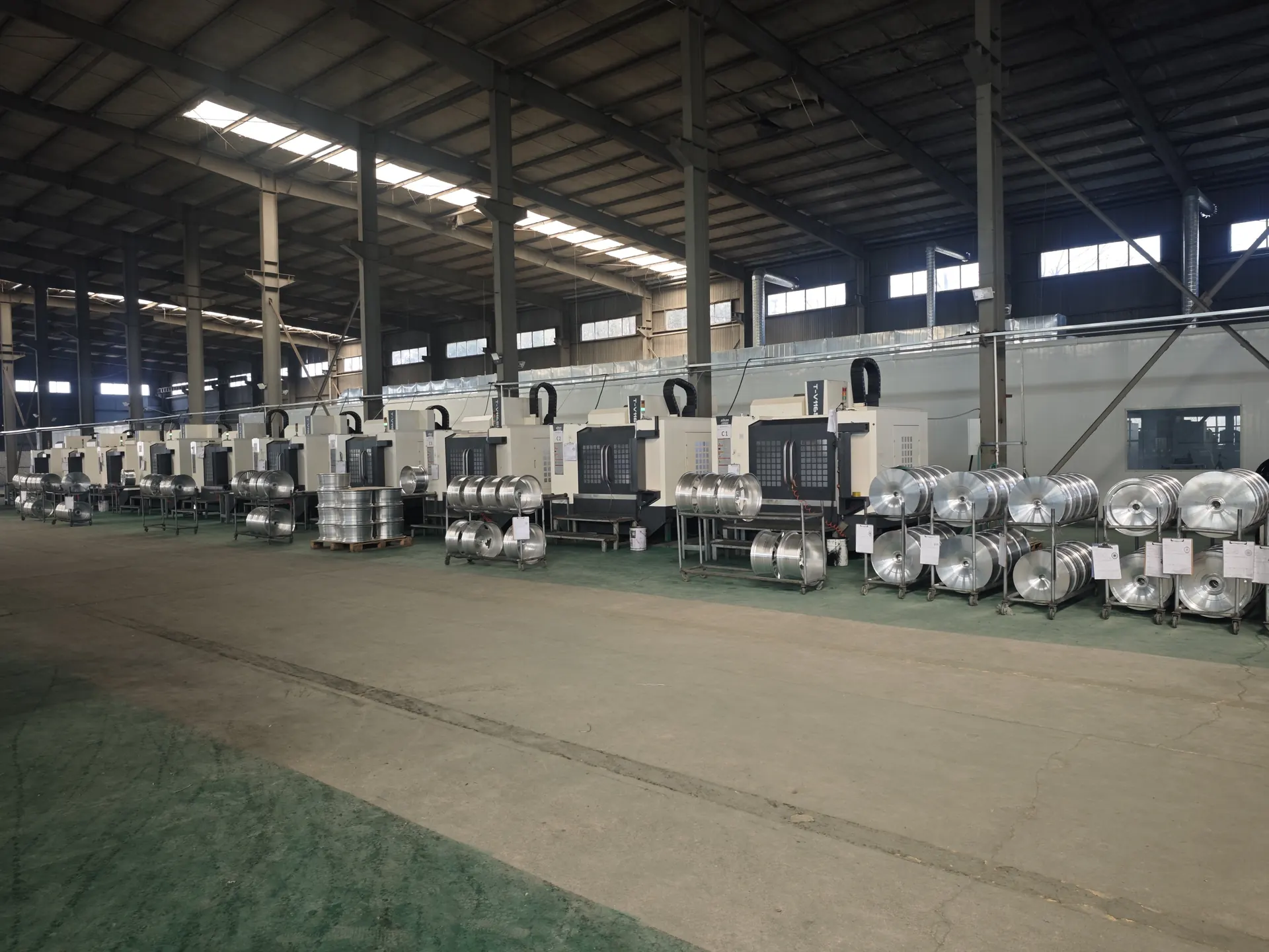 CNC machining line for custom alloy wheel production