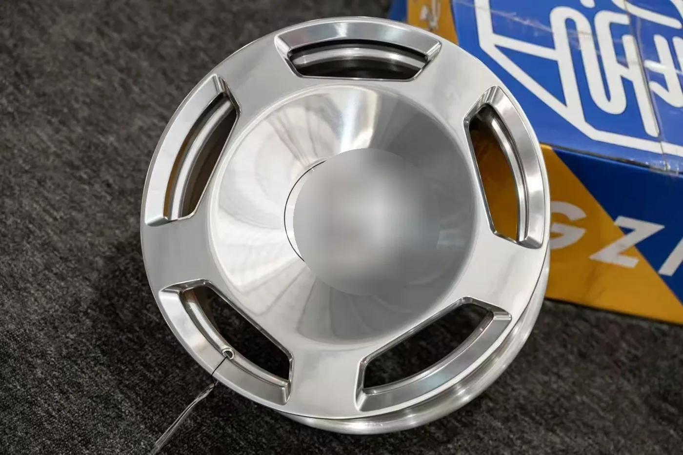 Brushed and polished disc design for a luxury sedan program