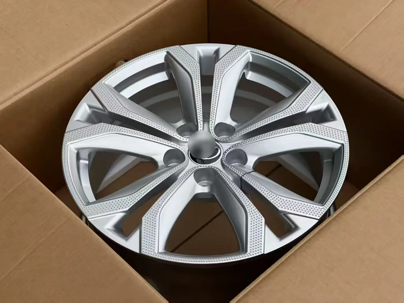 Silver finish wheel packed in its export carton – Toyota fitment